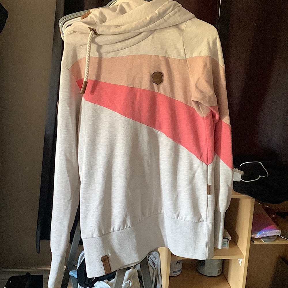 This is a heavyish sweater. Size L, brand is naketano, Color’s light pink